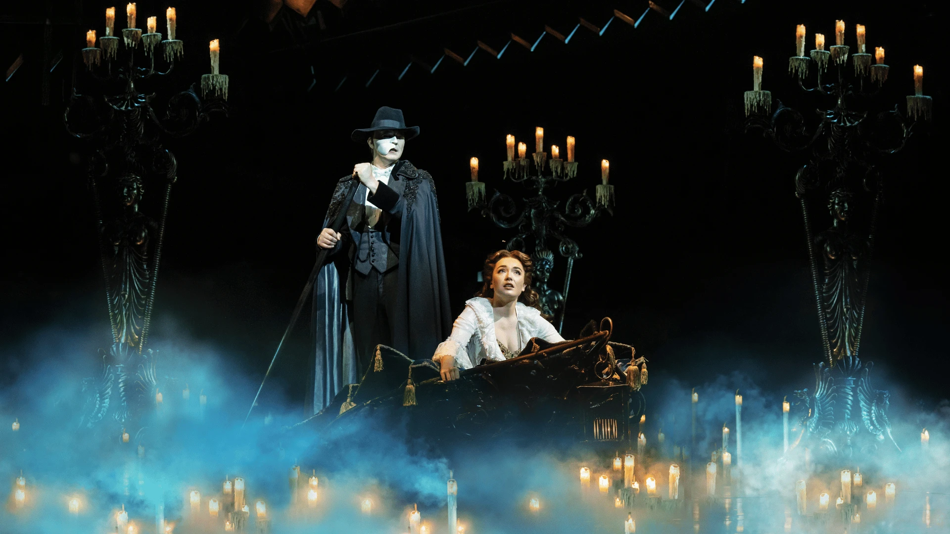 The famous masquerade scene at London's Phantom of the Opera. Masquerade with the Ensemble. Photo by Johan Persson